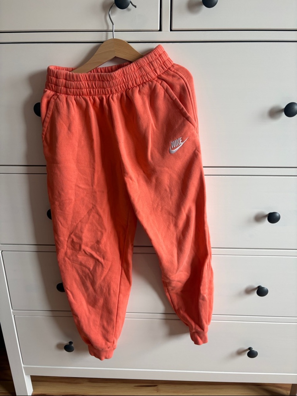 Nike Kids Coral-Orange Joggers with White Swoosh